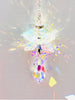 Handcrafted angel crystal suncatcher prism casting a vibrant full spectrum of color therapy rainbows