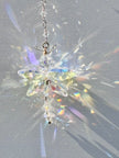 Unique artisan butterfly suncatcher made of rare Swarovski crystals being illuminated by the sun and casting amazing rainbows and sparkle.  