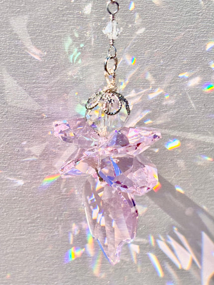 Unique handmade Fairy suncatcher made of rare pink Swarovski crystals and radiating beams of colors as sun hits it.