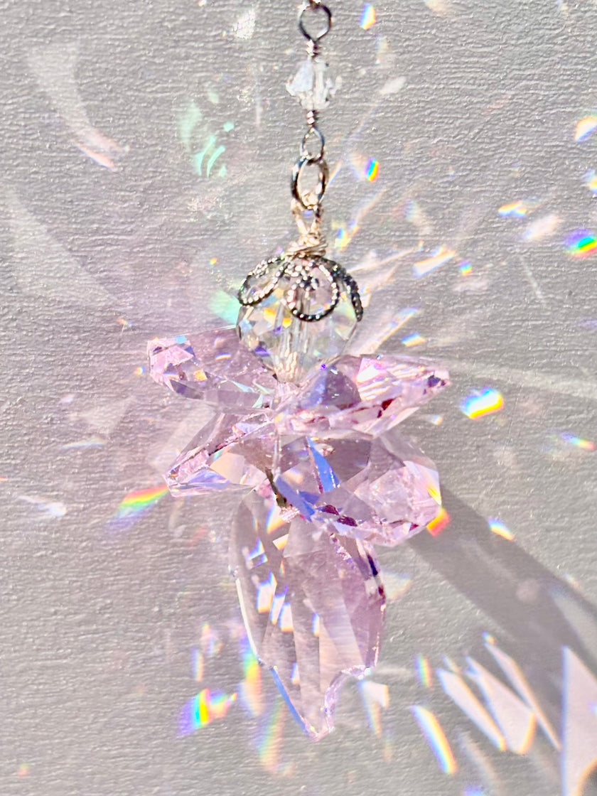 Unique handmade Fairy suncatcher made of rare pink Swarovski crystals and radiating beams of colors as sun hits it.