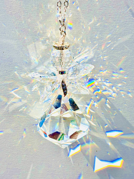 Unique handmade Angel Suncatcher made of rare Swarovski crystals that create magnificent sparkle and amazing prisms when sun illuminates it. 