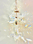 Handmade angel suncatcher made with Swarovski crystals emitting prisms of colors as the sun hits it. 