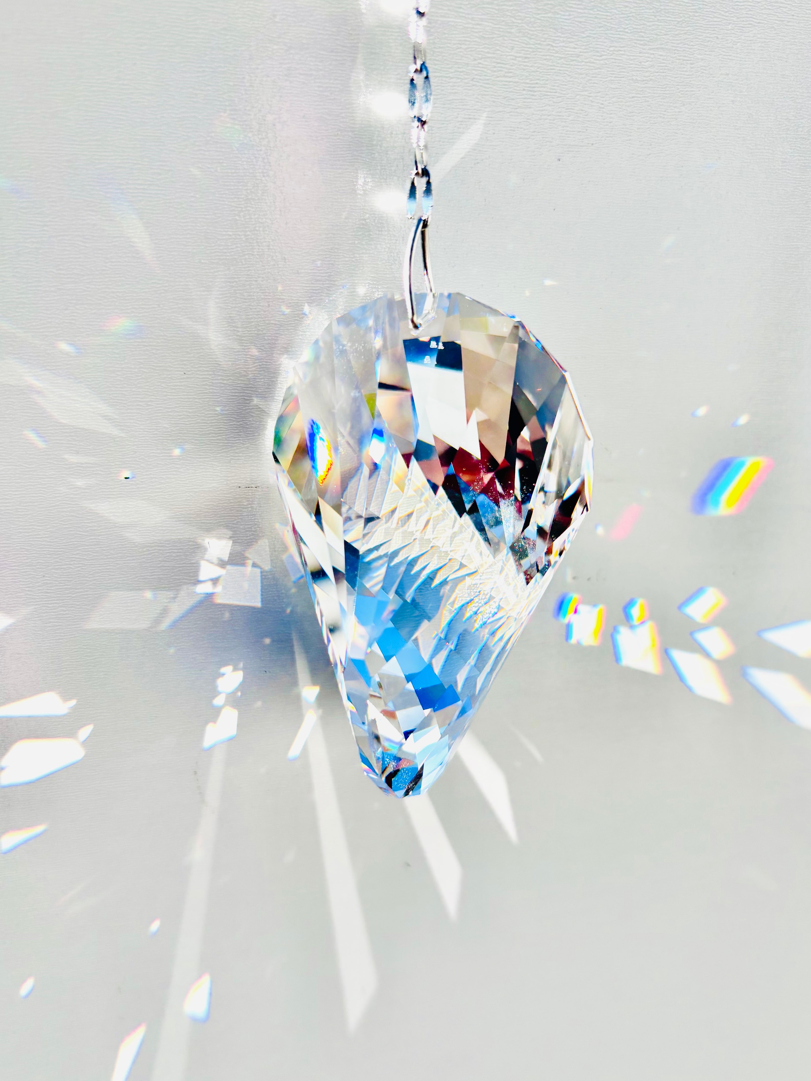 Rare Swarovski Oliod suncatcher illuminating large prisms of light as the sun its it beauty.