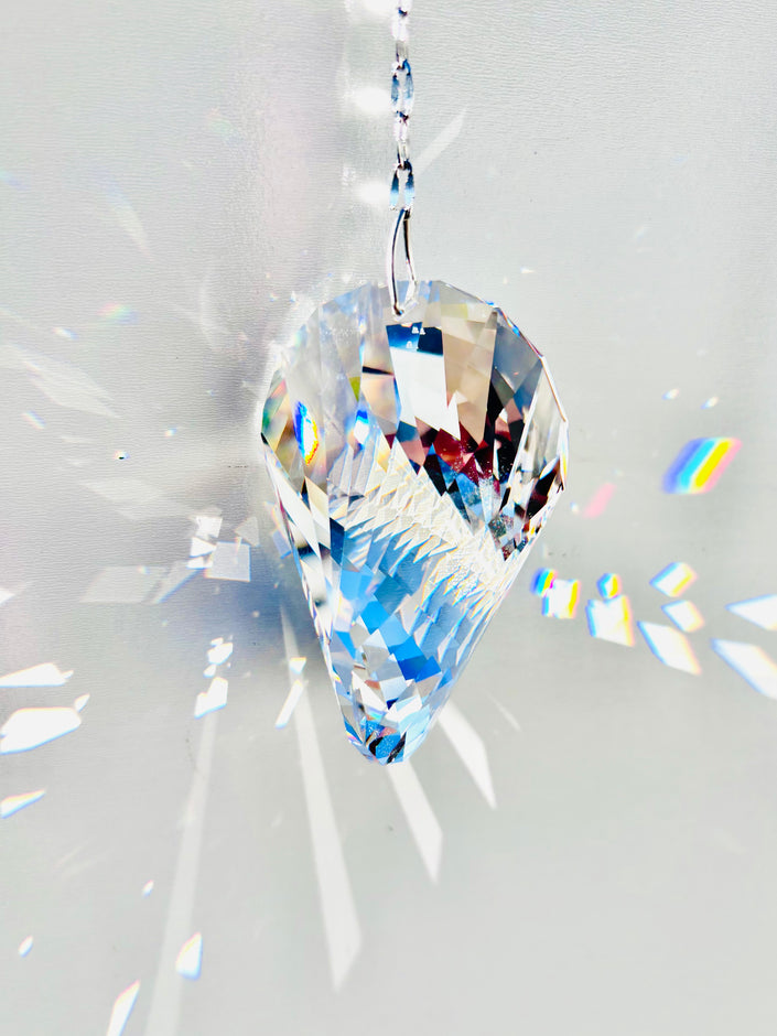 Rare Swarovski Oliod suncatcher illuminating large prisms of light as the sun its it beauty.