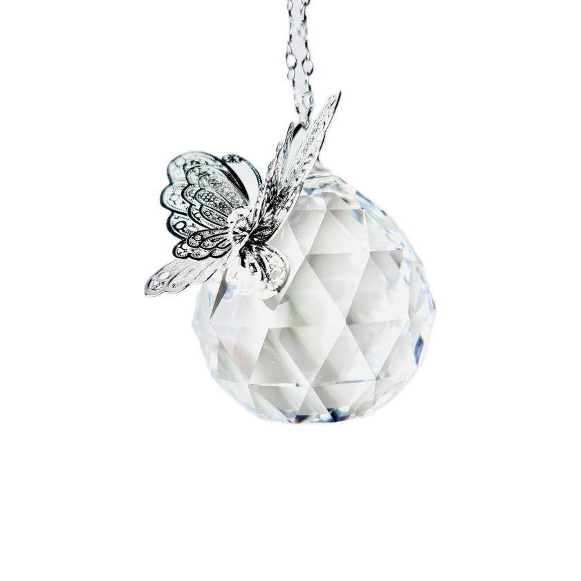 Handmade suncatcher featuring Rare Swarovski Crystal Ball with rhinestone butterfly hanging on a crystal strand. 