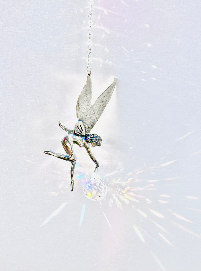 Pewter fairy suncatcher with a Rare Swarovski Aurora Borealis Crystal creating beautiful prisms of colors.