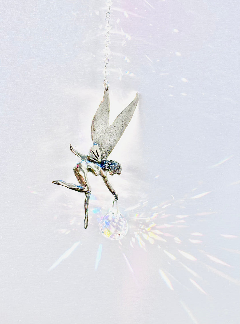 Pewter fairy suncatcher with a Rare Swarovski Aurora Borealis Crystal creating beautiful prisms of colors.