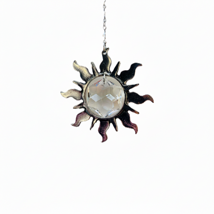 Handcrafted suncatcher featuring a pewter sun with a Swarovski Hex Crystal inside hung on a Swarovski Crystal strand with hook.  Named Sunspired with magical story card and packaged as gift.
